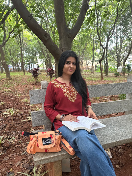 Peach Aura 4-Pocket Sling Bag